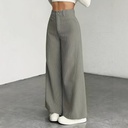 Women's high-waist wide-leg pants with a modern design and button details
