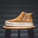 High-leg slip-on boots (no-lace design)