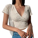 Slim cropped blouse with a V-neck and floral pattern