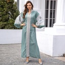 A modern, luxurious, and attractive abaya dress with an oriental touch