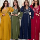 A luxurious dress with elegant embroidery inspired by Islamic style, combining sophistication and grace 