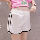 Women's low-rise maternity shorts with a flexible and comfortable design, perfect for pregnant women