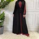 An elegant and luxurious abaya with an Islamic style